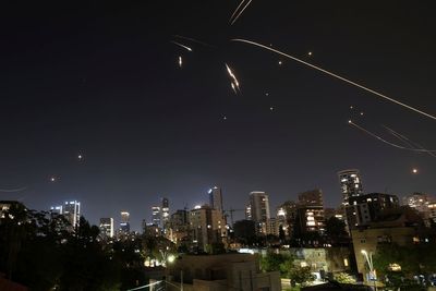 Israel bombarded by Iranian missiles after strikes on Tehran’s nuclear bases