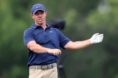 US Open: Angry Rory McIlroy narrowly survives cut as Scottie Scheffler clings on to leaders