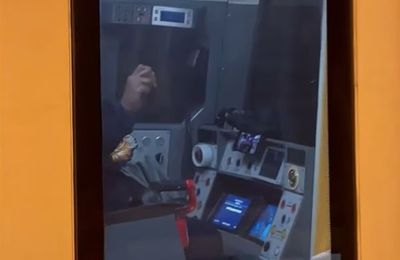 Shocking moment Tube driver KNITS and watches video on phone while operating train