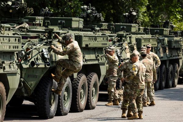 Millions expected at ‘No Kings’ protests before Trump’s military parade – live updates