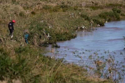 Rescuers still pulling bodies out of the water as death toll in South Africa floods reaches 86