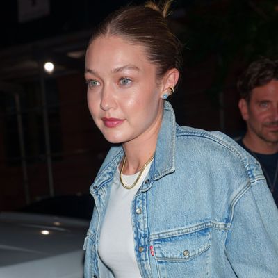 Gigi Hadid Pairs Metallic Track Pants and Mesh Flats for Double Date Night in New York