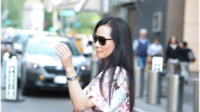 Lucy Liu’s platform trainers are the comfy and stylish way to elevate a summer dress instead of heels