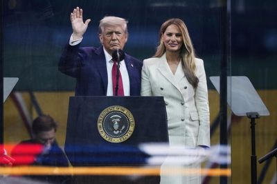 Gathering stormclouds can’t wipe smile from Trump’s face as long-held dream of military parade is realised