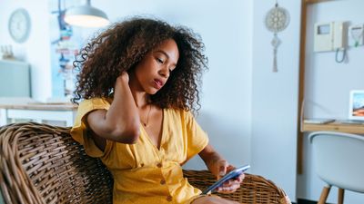 A physical therapist says bad posture is mostly caused by these four common lifestyle factors—here’s how to overcome them