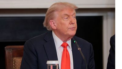 ‘Even his cult didn’t bother to show up’: Donald Trump’s $40 million parade flops as he looks bored stiff at his own festival