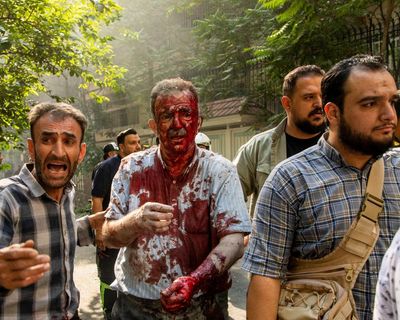 ‘There’s a smell of death in the air’: chaos in Tehran as residents try to flee or find shelter