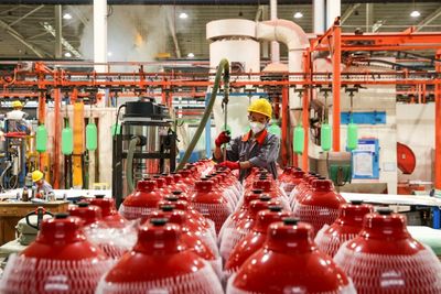 China Factory Output Slumps But Consumption Offers Bright Spot