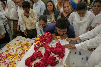 Relatives Wait For Remains After Air India Crash