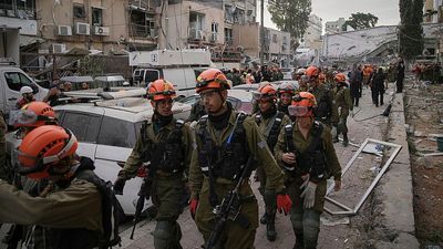 Israelis stock supplies as Iran launches fresh attacks on Israel