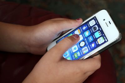Primary school pupils using screens for tests is ‘normalising’ use, Tories claim