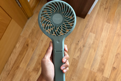 John Lewis’s £12 handheld fan is our go-to for beating the heat this summer