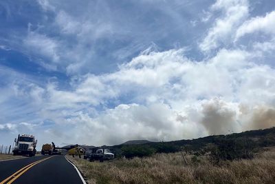 Fast-moving brush fire on Hawaii's Maui island evacuates about 50 people. No structures have burned