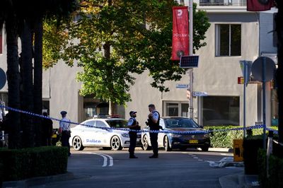 Police hunt masked gunmen who shot three people at Sydney kebab shop in ‘brazen’ daylight attack