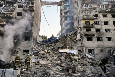 Russian Strikes Kill 14 In 'Horrific' Attack On Kyiv