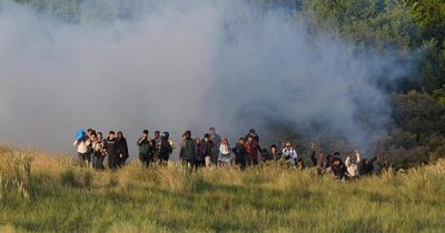 Tear gas fired at people as French police intervene in small-boat crossing