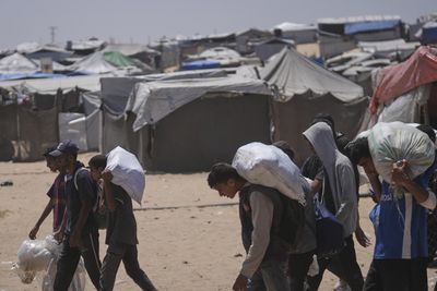 Israel kills at least 70 Palestinians in Gaza’s deadliest day at aid sites