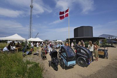 A tiny church in Denmark celebrates community and coziness within 12 walls — one for each apostle
