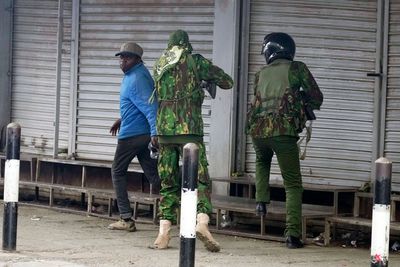 Photos capture the shooting of a civilian by a Kenyan police officer amid protests