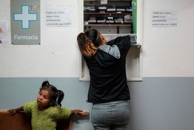 Argentines reel from health care cutbacks as President Milei's state overhaul mirrors Trump's