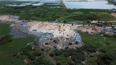 Discarded clothes from UK brands dumped in protected Ghana wetlands