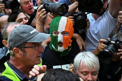 Huge crowds of Kneecap supporters rally outside court as Mo Chara appears on terrorism charge