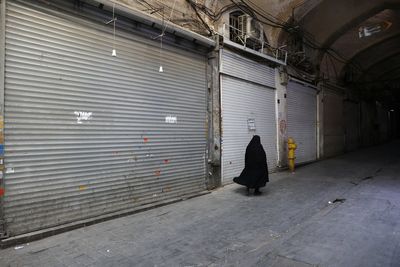 Life inside Iran: How war reduced bustling Tehran to a desert of empty streets and boarded-up shops