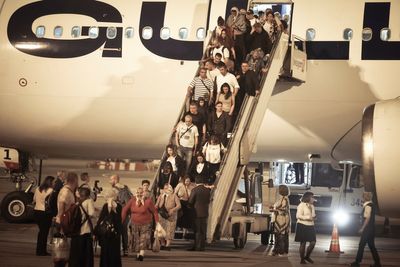 Photos show efforts to evacuate foreigners from the Israel-Iran conflict