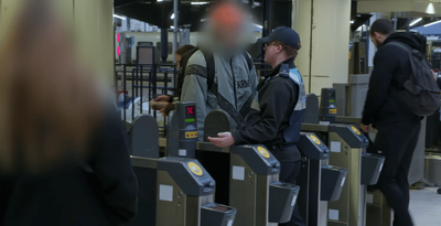 Moment London fare dodger is confronted by ticket inspectors — only to walk away scot-free