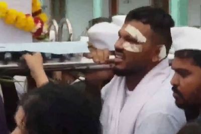 British survivor of Air India crash seen carrying brother’s casket at funeral