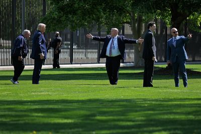 ‘These are the most magnificent poles made’: As Middle East rages, Trump brags about new flag poles at the White House
