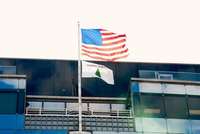 Far-right flag used by Jan 6 rioters flown above government agency in DC