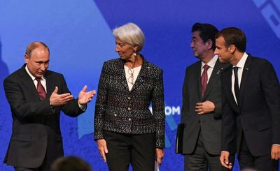 Putin T-shirts, Robots And The Taliban -- But Few Westerners At Russia's Davos