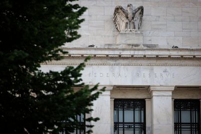 Federal Reserve holds interest rates, defying Trump’s demand to lower them