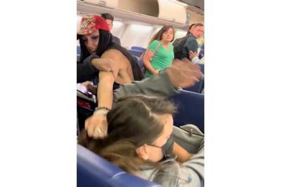 Woman Kicked Off Flight After Pulling Woman's Hair, Saying She 'Didn't Want to Sit Next to a Fat Lady'