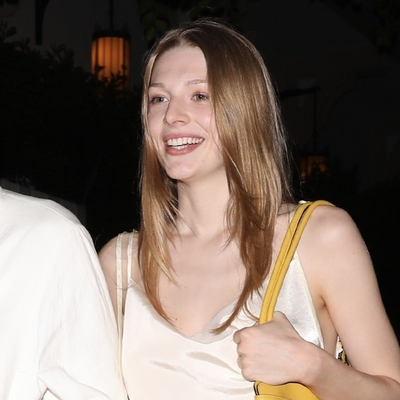 Hunter Schafer Swaps Butter Yellow for a $4,500 Turmeric-Hued Prada Bag