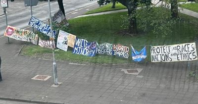 Group of 'neo-Nazis' thrown out from council meeting about 'far-right racist' banners