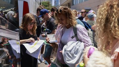 Governments scramble to evacuate their citizens from Israel and Iran