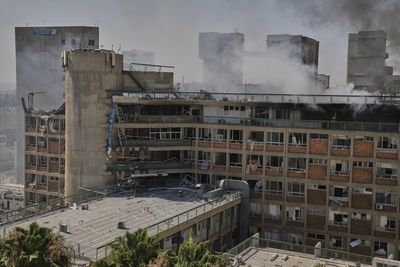 Israel attacks Iran’s Arak reactor as Iranian missile hits Israeli hospital