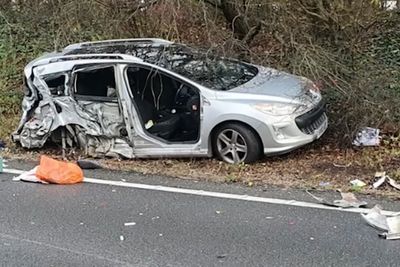 Moment distracted driver on his phone ploughs into broken-down car leaving victim with horrific injuries