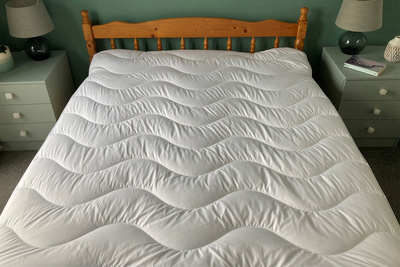 9 best cooling mattress toppers, reviewed in a heatwave