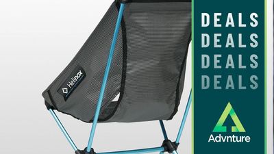 Tired of sitting on your hard cooler at camp? The clever, comfortable, and compact Helinox Chair Zero revolutionized backpacking, and it's 20% off at REI right now while stocks last