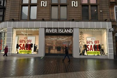Business news live: FTSE 100 falls and River Island announce 33 shop closures