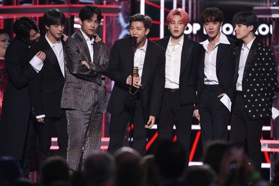 All of BTS has returned as Suga is discharged from an alternative form of military service