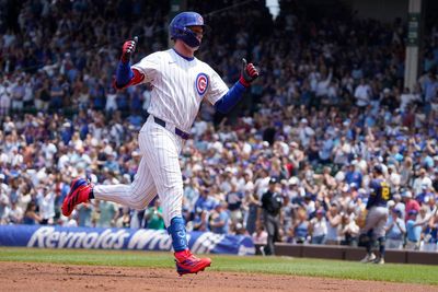 Baseball fan removed from Wrigley Field after climbing net to retrieve bat