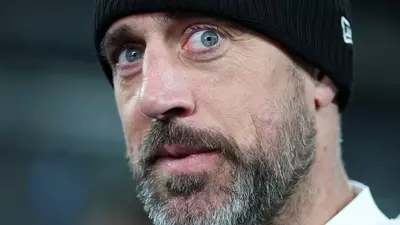 Is Aaron Rodgers fake married? Evidence mounts as bigmouth QB takes long beach walk alone