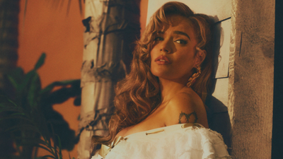 Karol G's 'Tropicoqueta' Album Surprises Fans With Thalía, Feid, and A Steamy Video With Marvel and Top Gun Actor Danny Ramírez