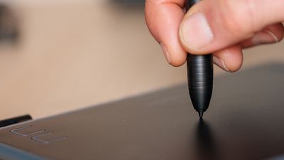 I bought the cheapest drawing tablet I could find. For photo editing, there's no need to spend more