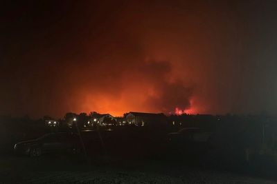 Fast-moving blaze in southwest Utah destroys a dozen structures and forces evacuations