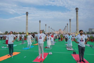 Indians stretch, breathe and balance to mark International Day of Yoga